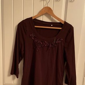 Brown blouse with details in the front